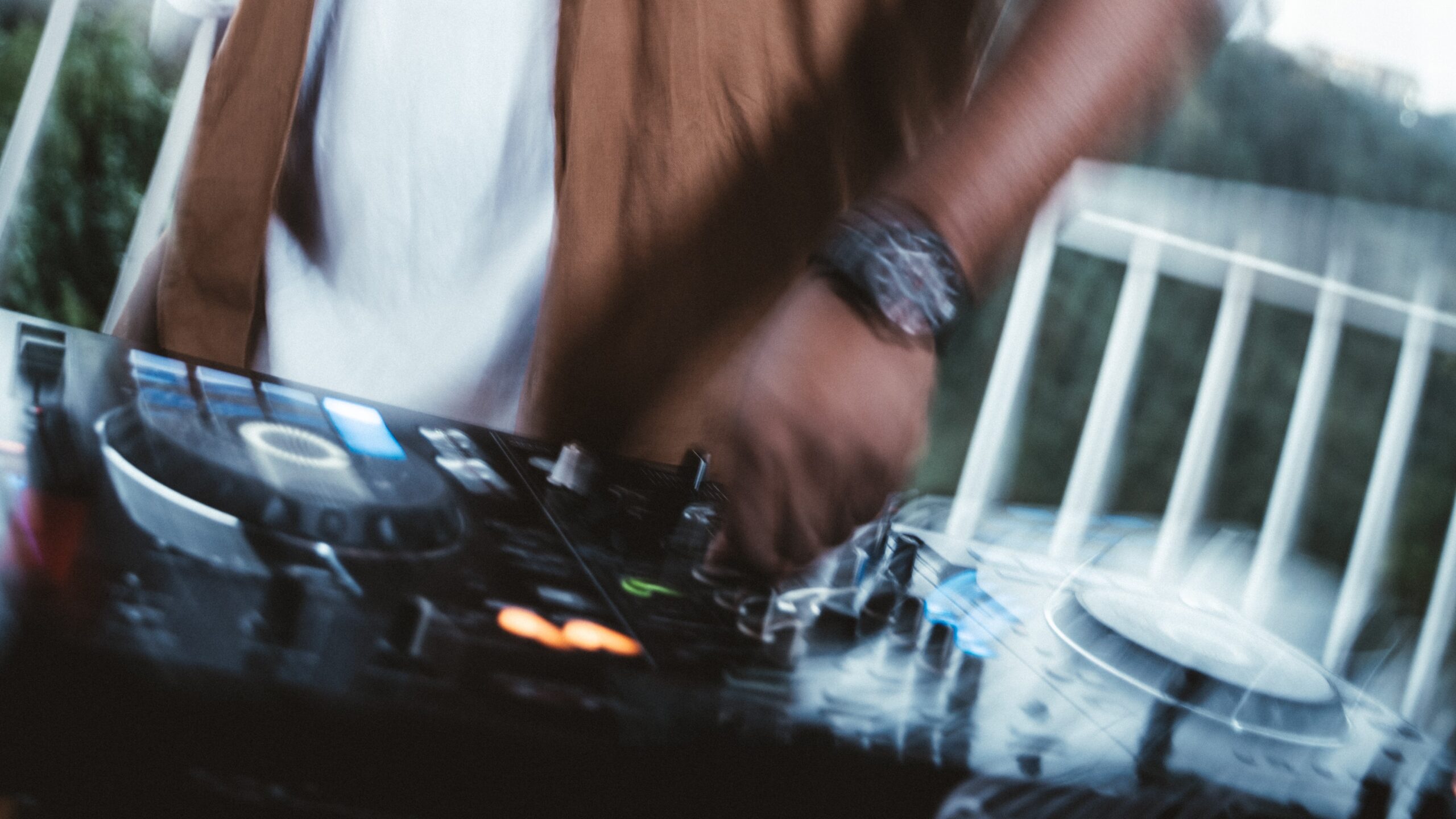 DJ executing creative equalization and filter sweep transitions during practice